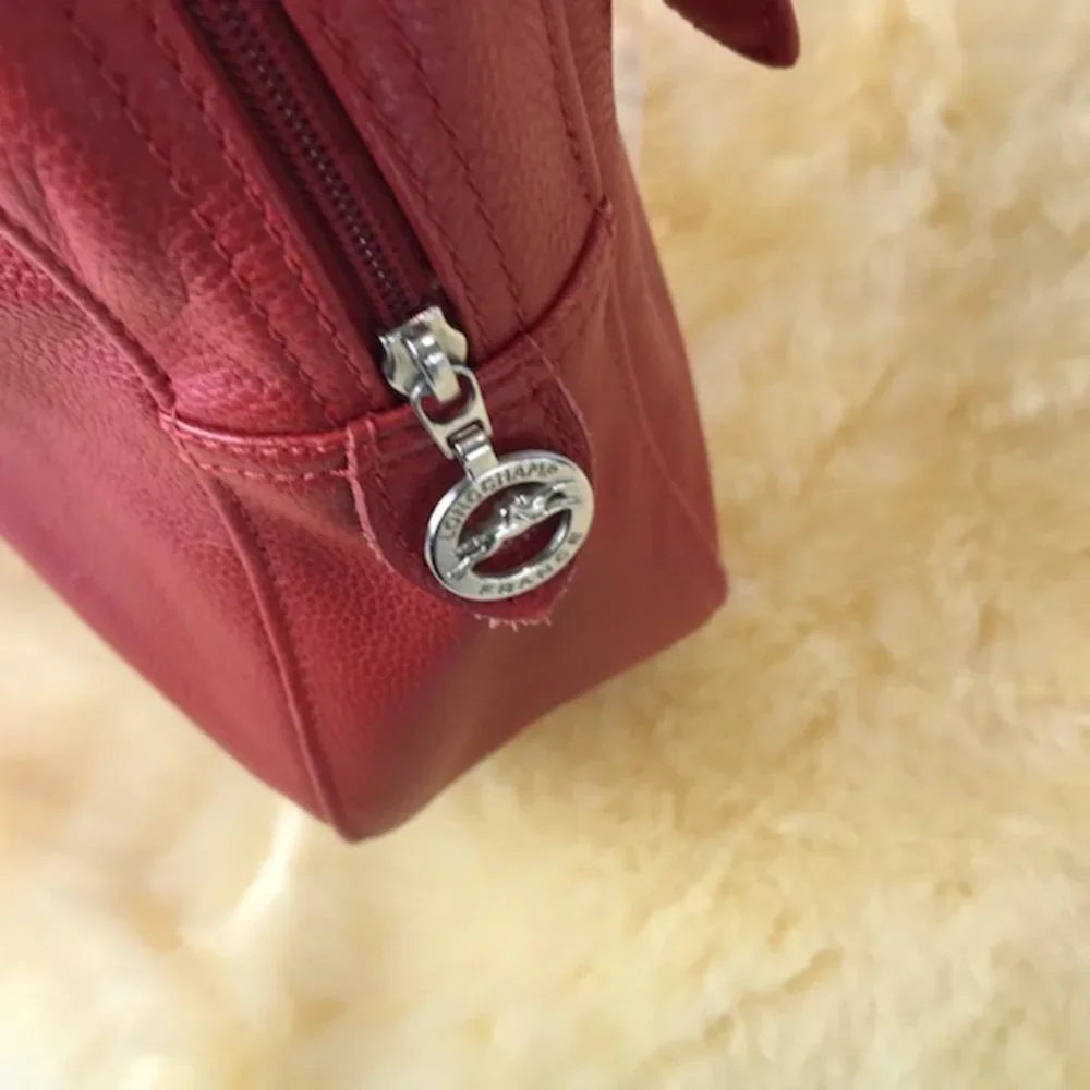 longchamps red pebbled leather satchel bag